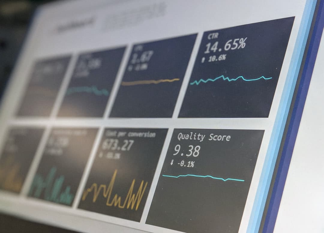 Close-up of a computer monitor displaying YouTube analytics dashboard with graphs and scores.