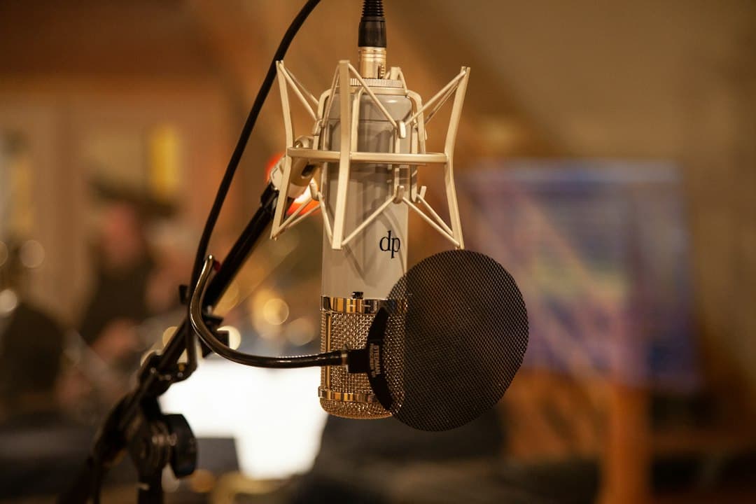 Professional microphone setup for faceless YouTube creator audio recording.