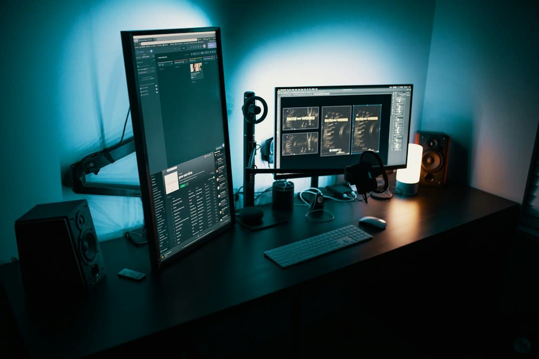 Dual monitors displaying video editing software and YouTube analytics for content gap research.